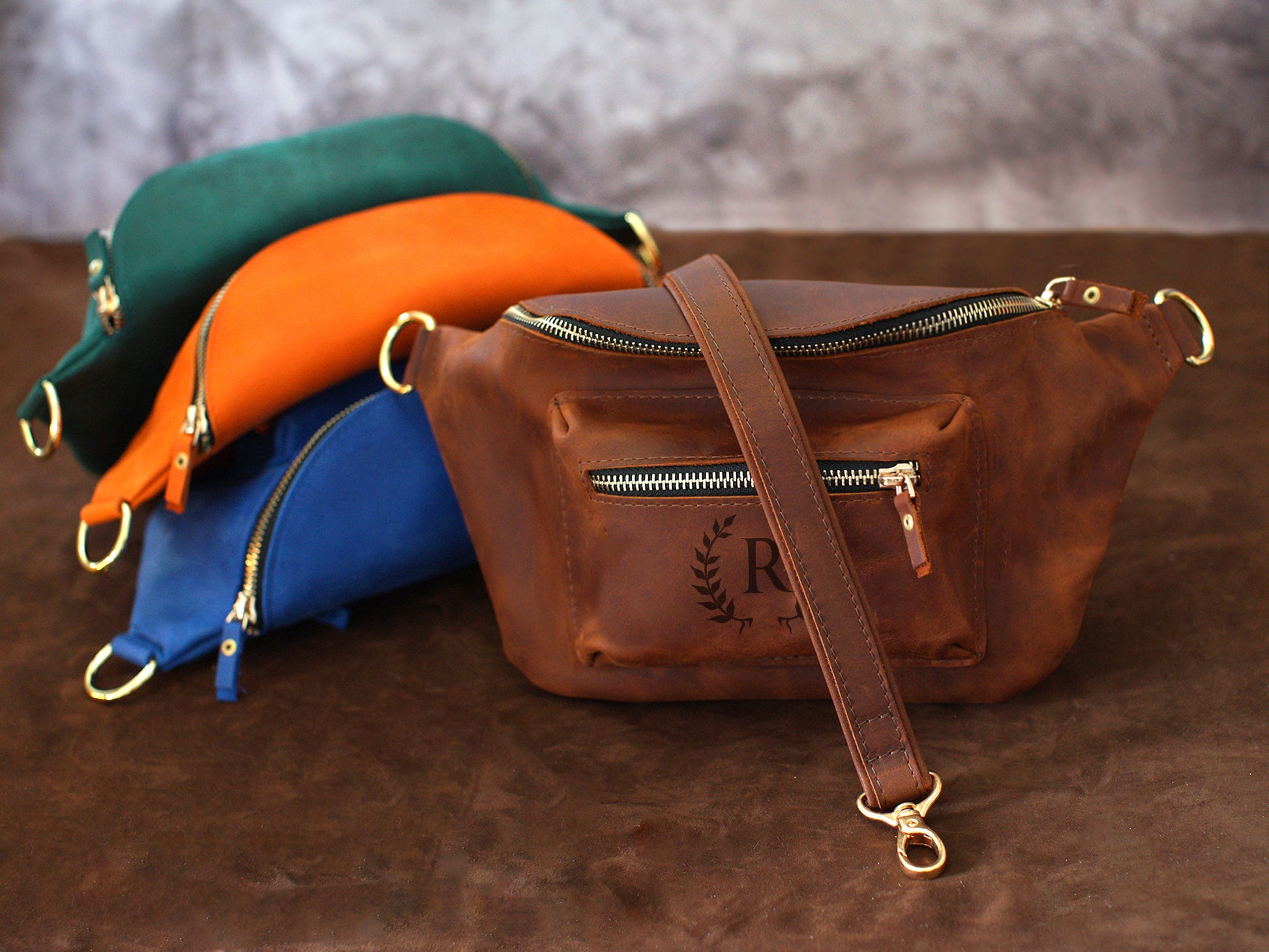 Natural leather crossbody sling with warm patina, artisan craftsmanship