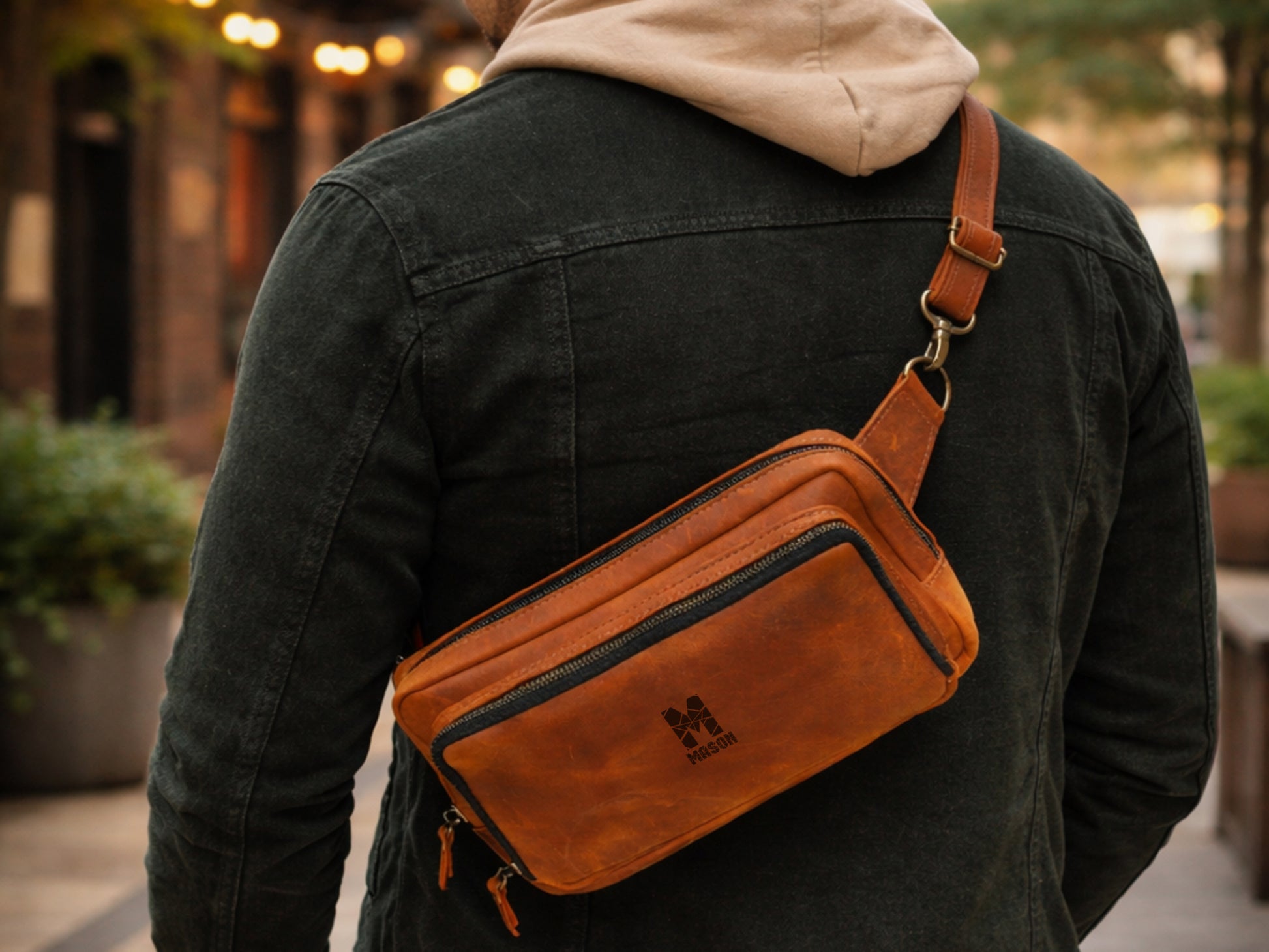 Leather sling bag interior pockets detail, organized daily carry