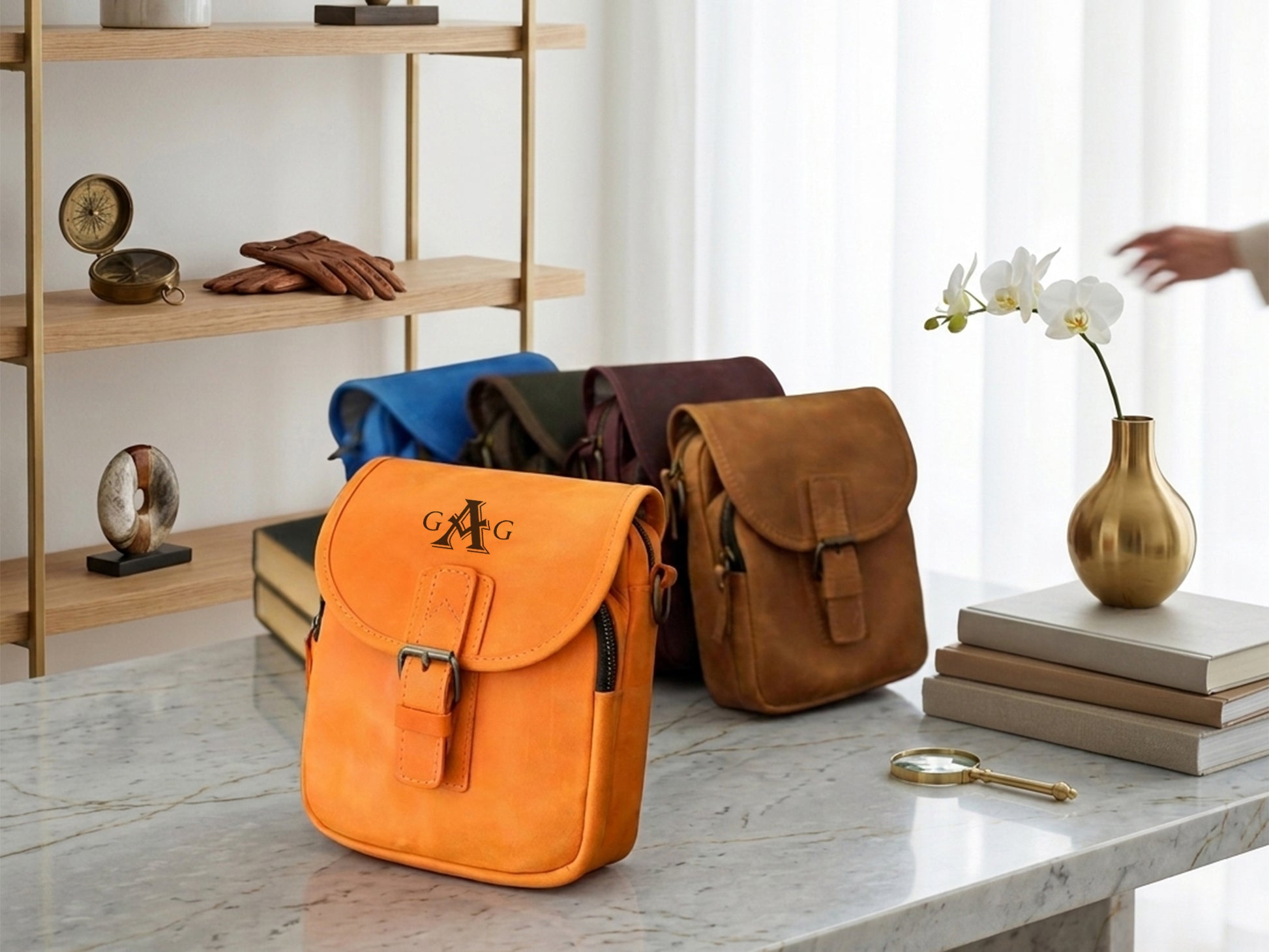 Four bags in different colors on a marble surface with a shelf in the background.