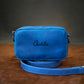 Personalized monogram engraving on handcrafted leather crossbody bag