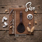 A brown leather luggage tag or keychain holder laid flat on a rustic wooden surface, with measurement lines showing overall length and width. White wireless earbuds, dried flowers, and a round white device are placed around it as styling props.
