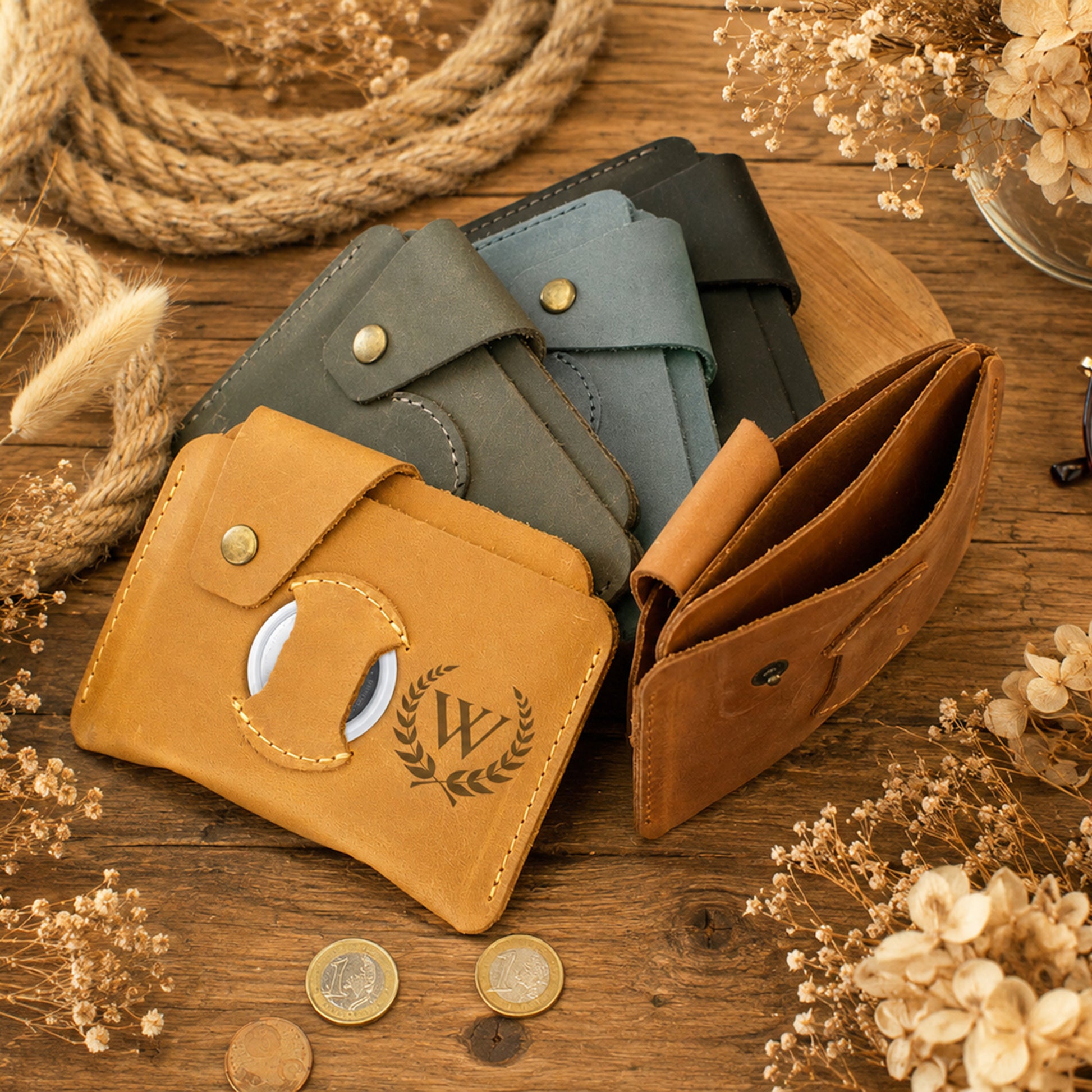 Person holding personalized leather AirTag wallet, lifestyle editorial photo