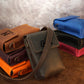 Person wearing personalized leather messenger bag, street style shot