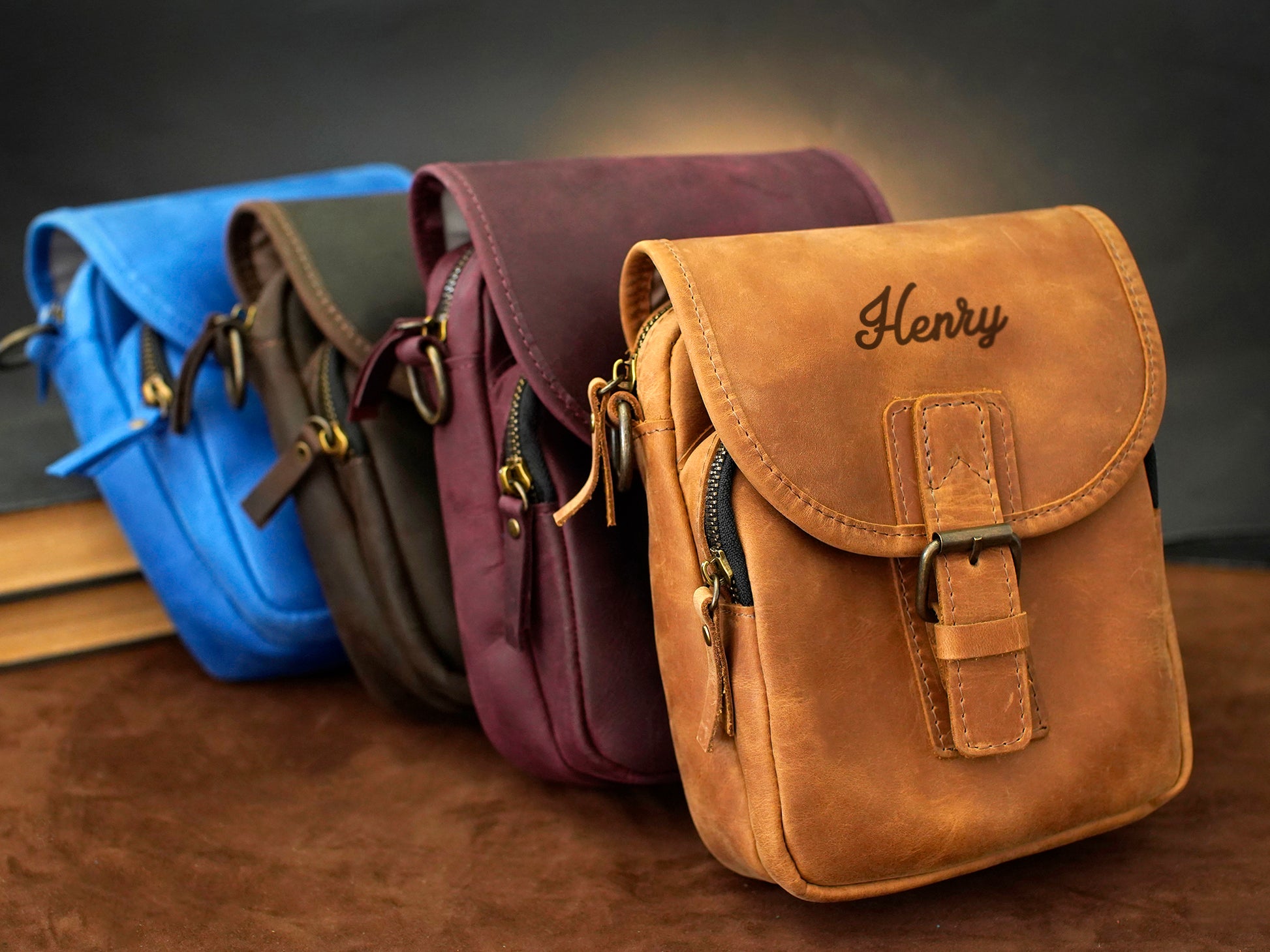 The Rover leather messenger bag in use outdoors, warm earthy tones
