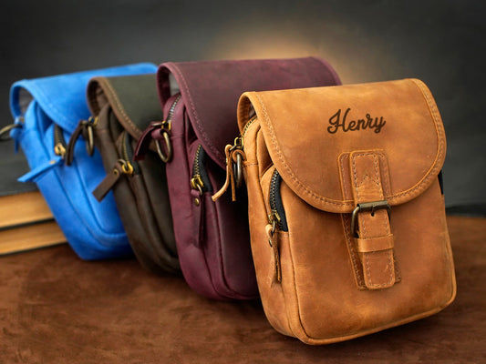 The Rover leather messenger bag in use outdoors, warm earthy tones