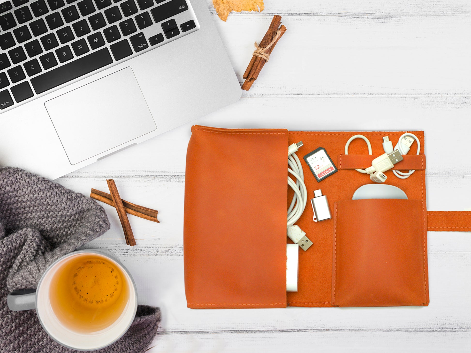 Leather cord organizer interior pockets detail, organized tech travel case