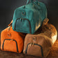 Person carrying personalized leather duffle bag, lifestyle editorial photo