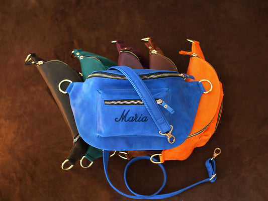 Leather crossbody sling with custom monogram, smart organization detail