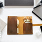 Person carrying personalized leather cable organizer, lifestyle shot