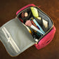 The large leather toiletry case in use outdoors, warm earthy tones