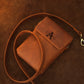 The Urban Explorer leather bag worn crossbody, warm earthy tones