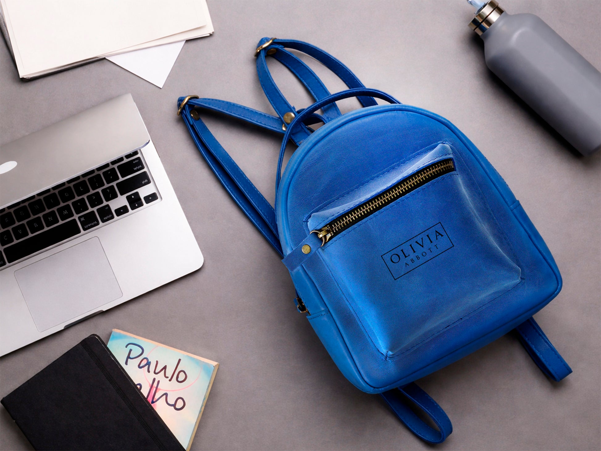 Leather mini backpack interior pockets detail, compact daypack organizer