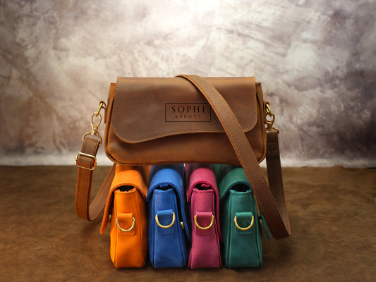 Personalized monogram engraving on handcrafted leather crossbody pouch