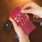 Leather jewelry pouch with custom name engraving, warm brown tone