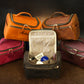 Leather toiletry case with custom name engraving, warm brown tone