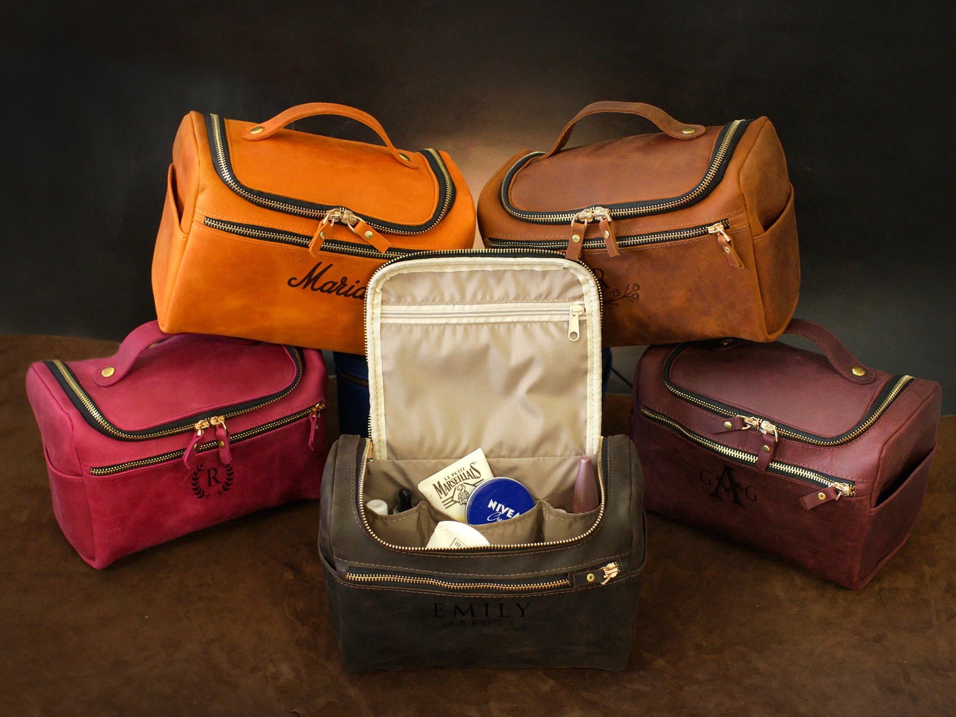 Leather toiletry case with custom name engraving, warm brown tone