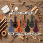 Six personalized leather keychains in different colors (blue, brown, orange, tan, green, burgundy) are arranged on a rustic wooden background with decorative dried plants and tools. Each keychain has a leather loop with a monogrammed or engraved initial.