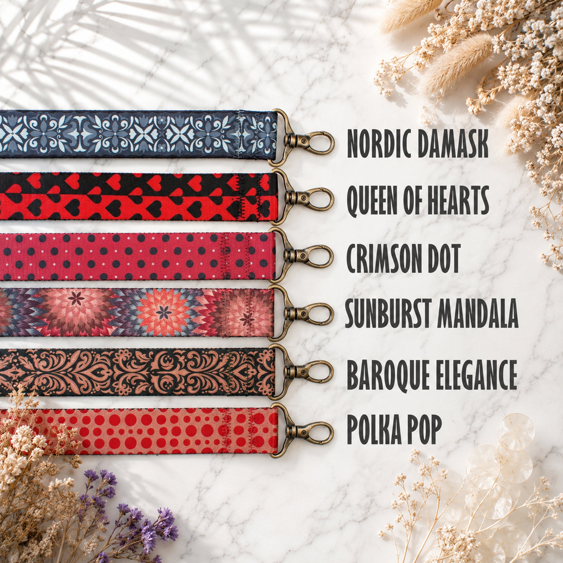 Collection of patterned straps with decorative ends on a marble surface.