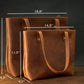 Close-up of leather tote bag zipper and hardware detail
