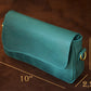 Premium leather crossbody pouch with name stamp, warm earthy tone