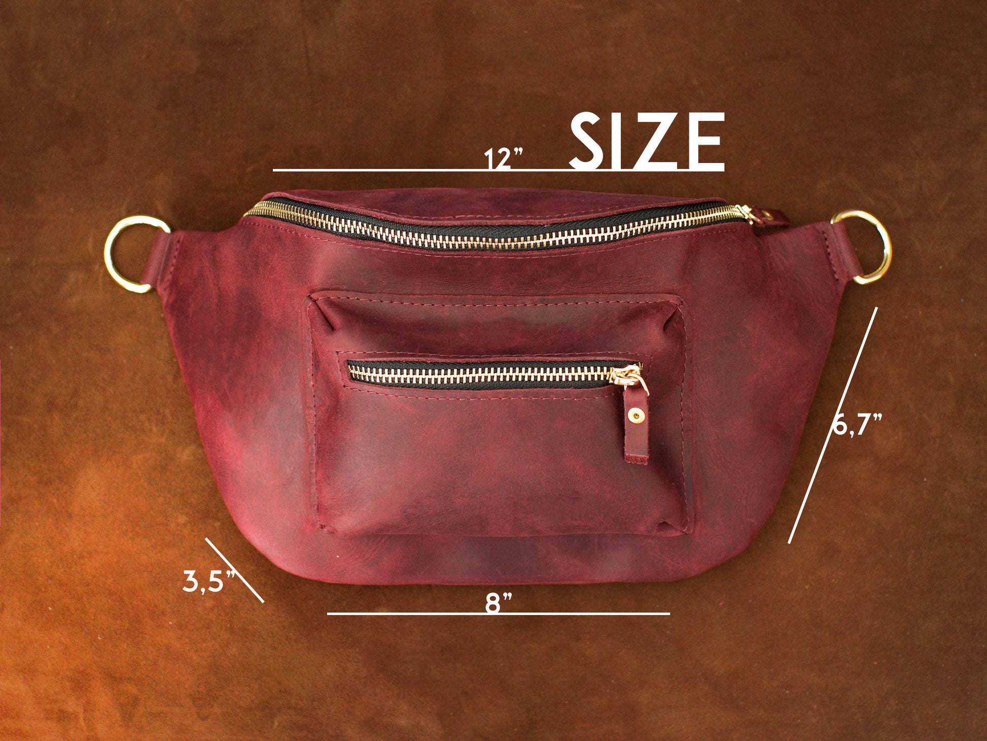 Leather sling bag collection with personalized engravings, lifestyle flat lay