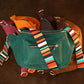 Handcrafted leather sling bag with monogram, gift-ready presentation