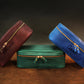 Brown leather lingerie pouch with custom monogram engraving, front view