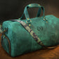 Leather duffle bag collection with personalized engravings, lifestyle flat lay