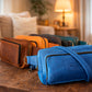 Brown leather sling bag with custom monogram engraving, front view