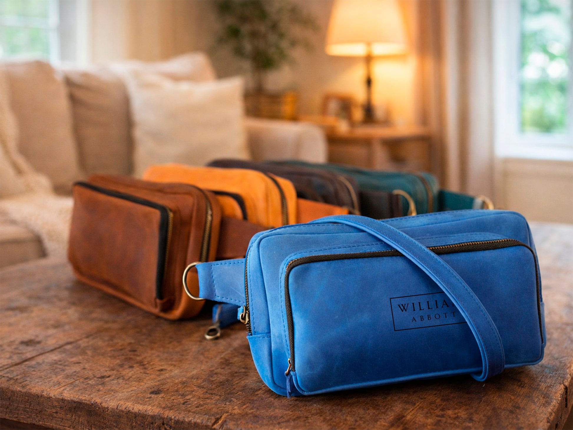 Brown leather sling bag with custom monogram engraving, front view