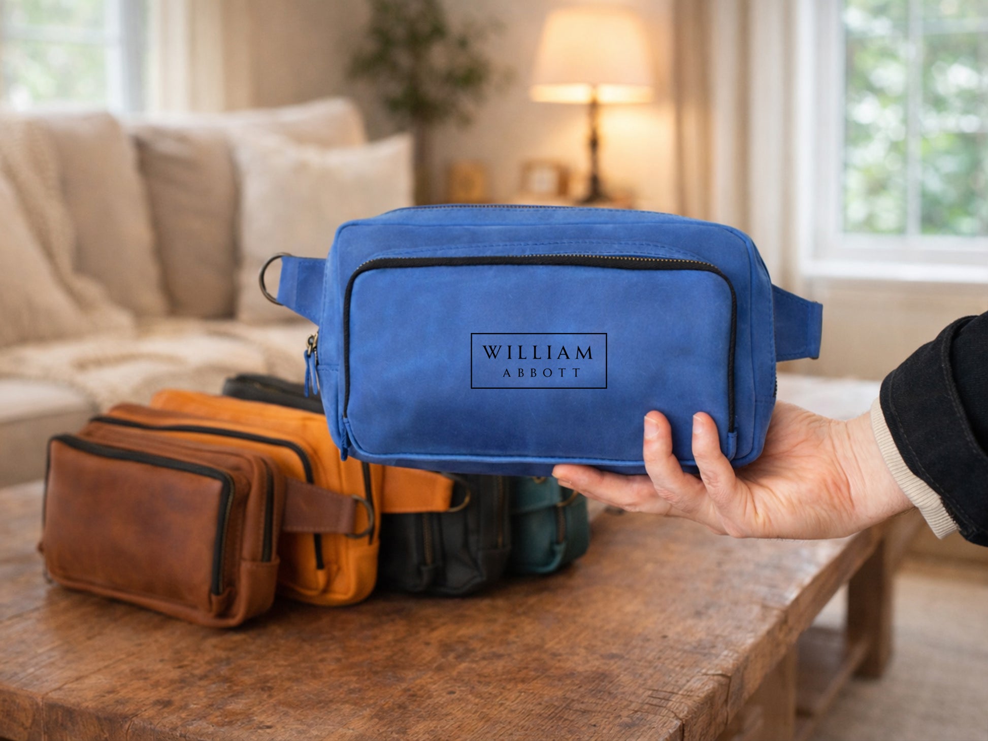 Leather crossbody bag collection with personalized engravings, lifestyle flat lay
