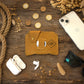 The Navigator leather wallet, angled product view with card slots visible