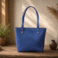 Person carrying personalized leather tote bag, lifestyle editorial photo