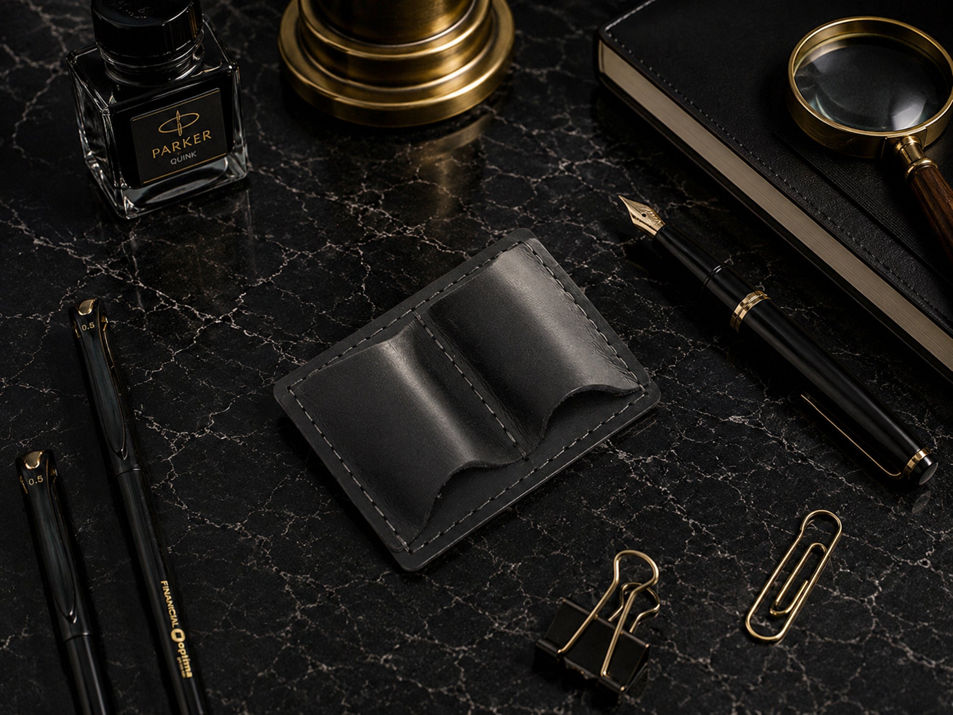 Brown leather pen holder with custom monogram engraving, front view