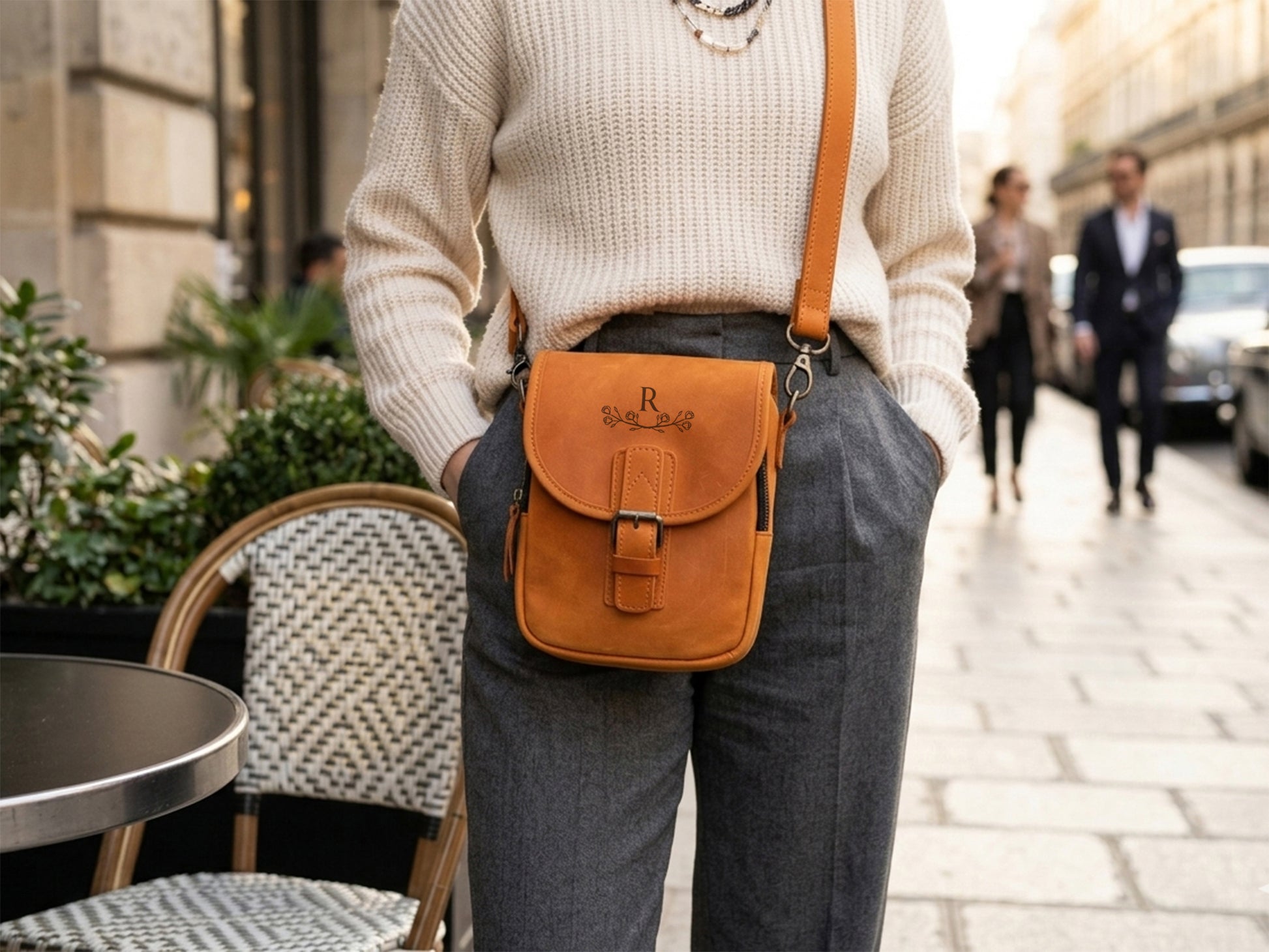 Brown leather vertical crossbody bag with custom monogram engraving, front view