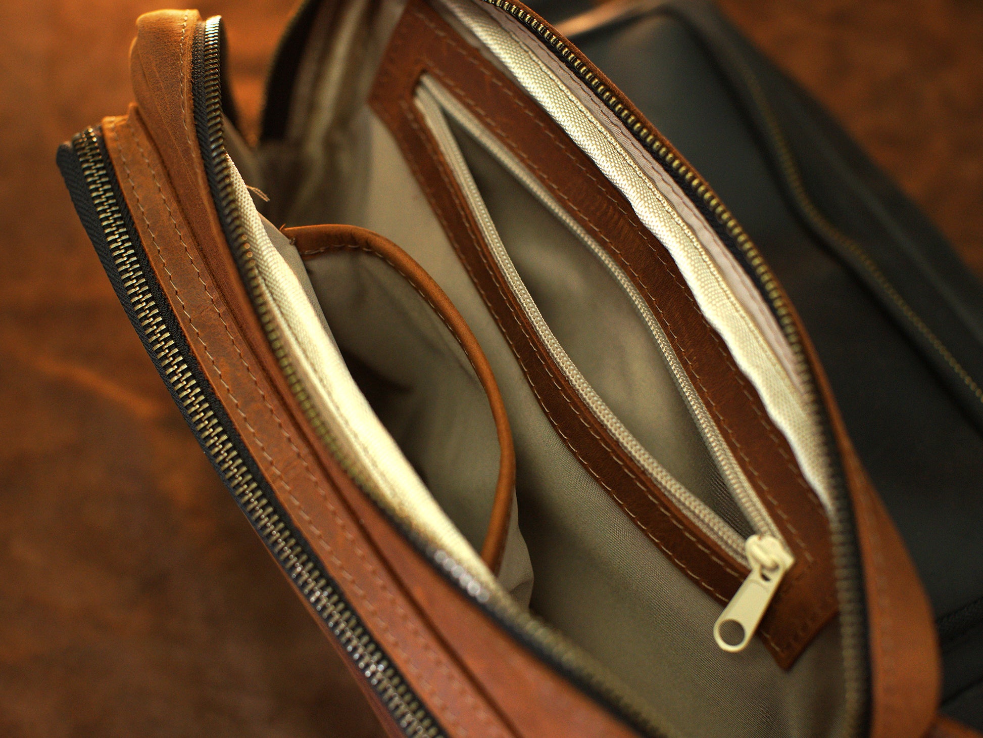 Brown leather crossbody bag with custom monogram engraving, front view