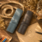 Brown leather pencil roll with custom monogram engraving, front view