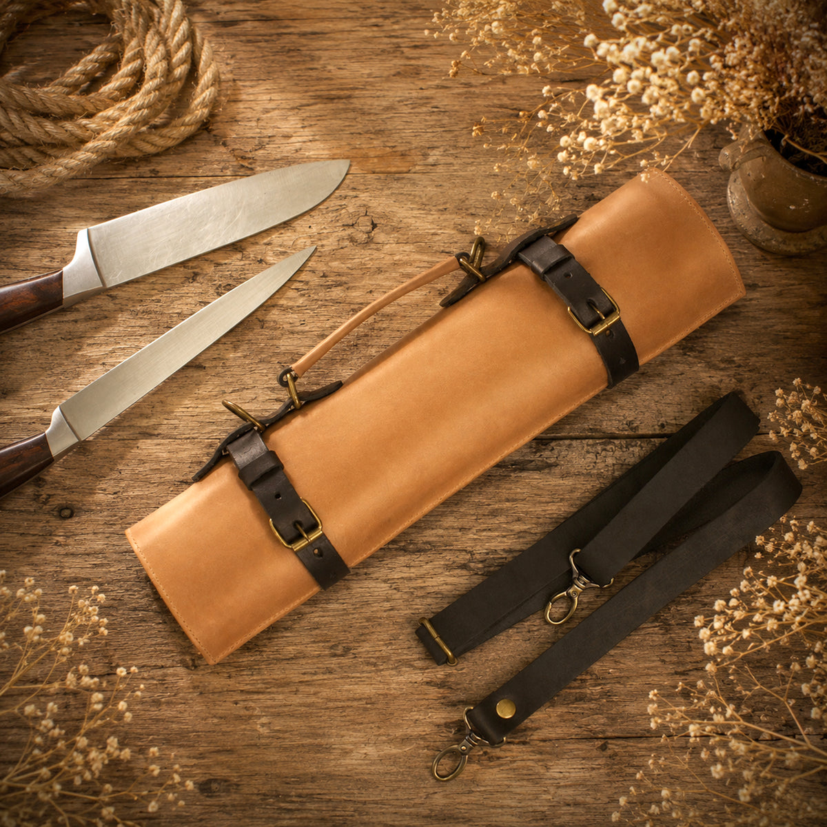 Minimalist leather blade guard roll with buckle straps, handcrafted design