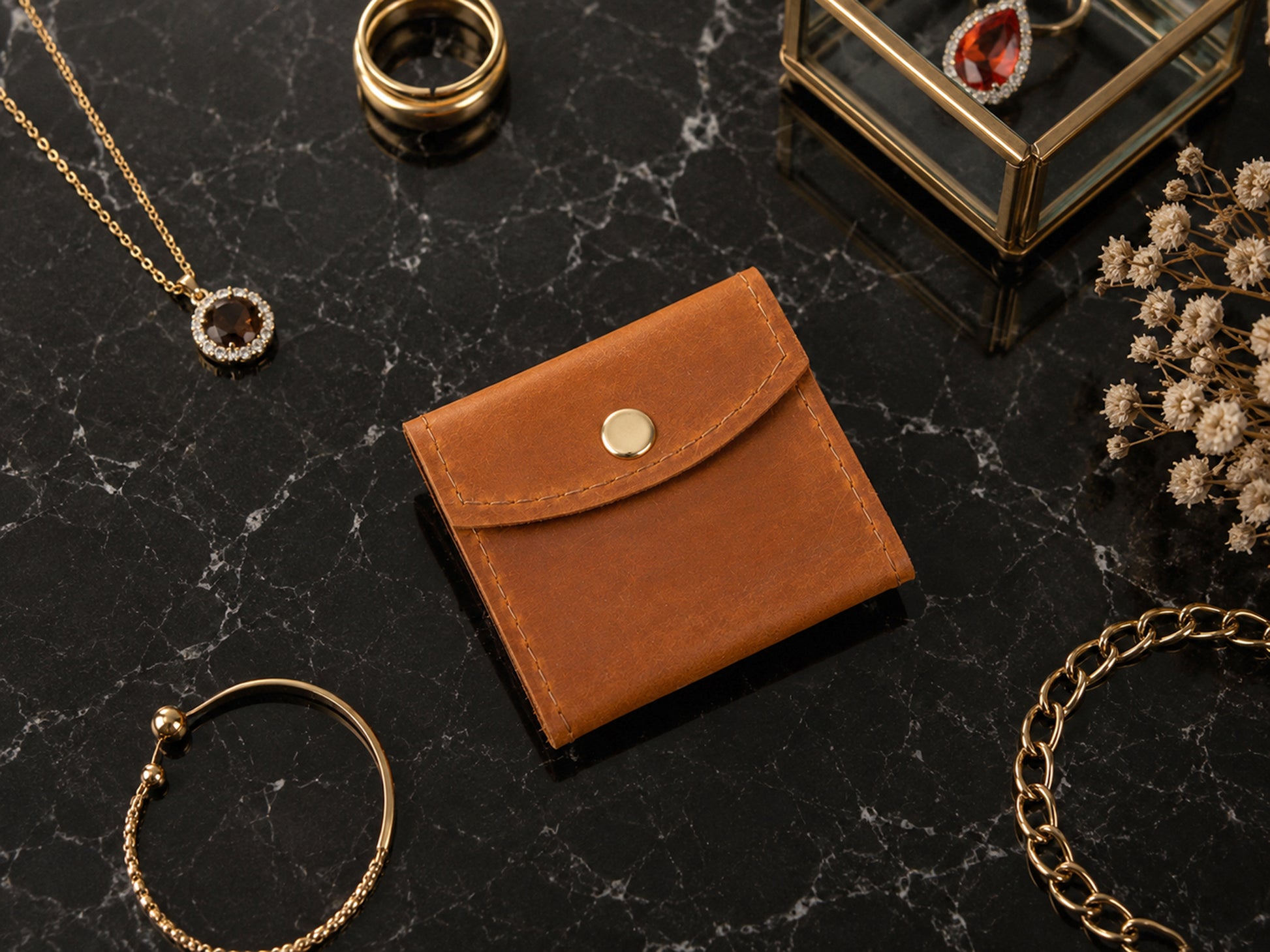 The Treasure Wrap personalized leather jewelry pouch, side profile view