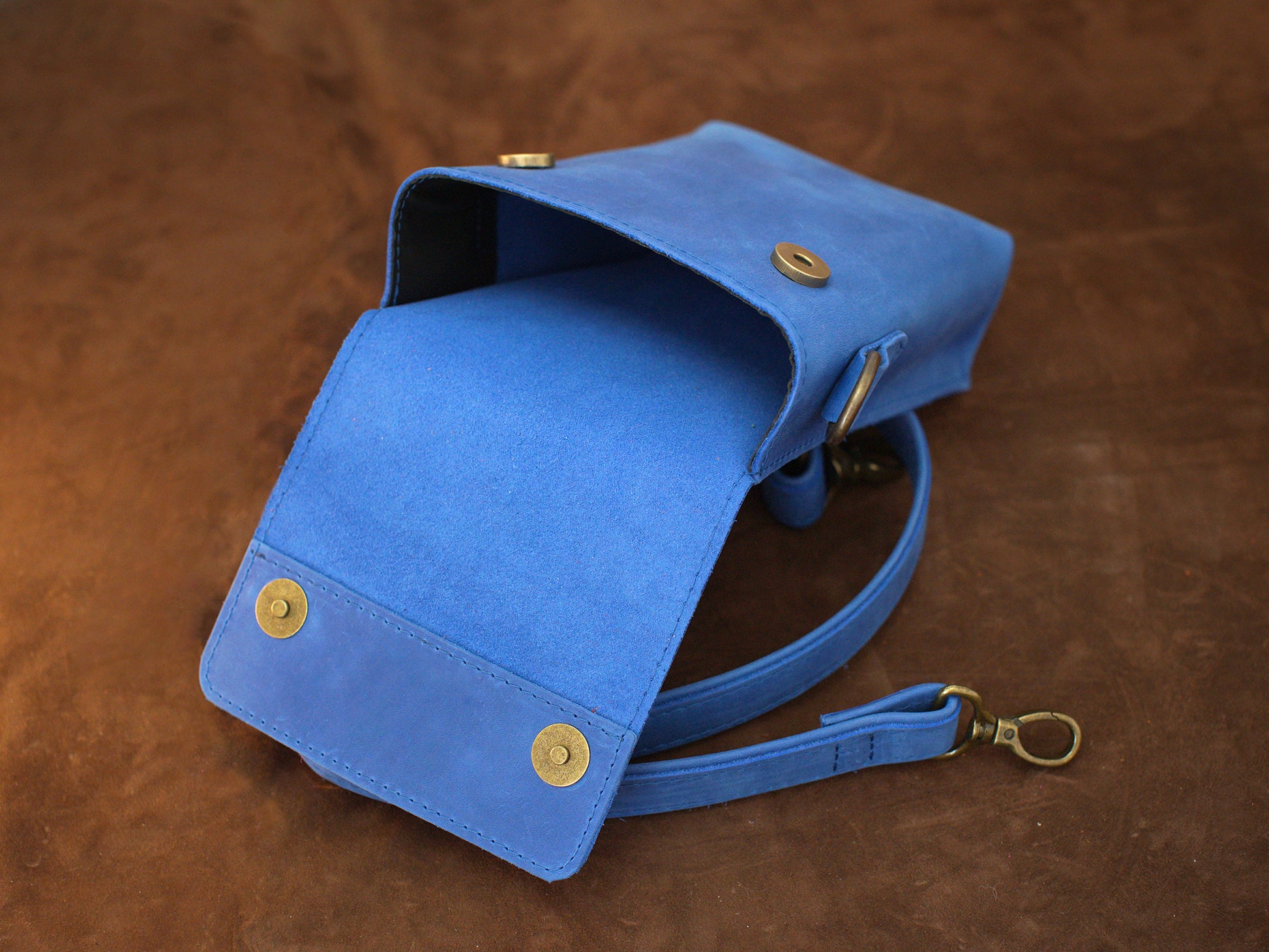 Premium leather vertical bag with name stamp, warm earthy tone
