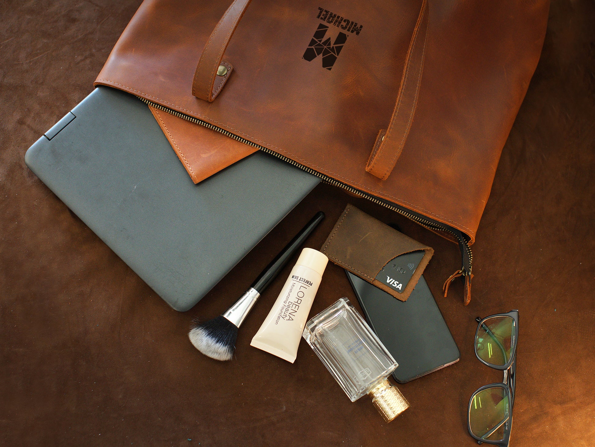 The Everyday Essential leather tote bag, side profile view