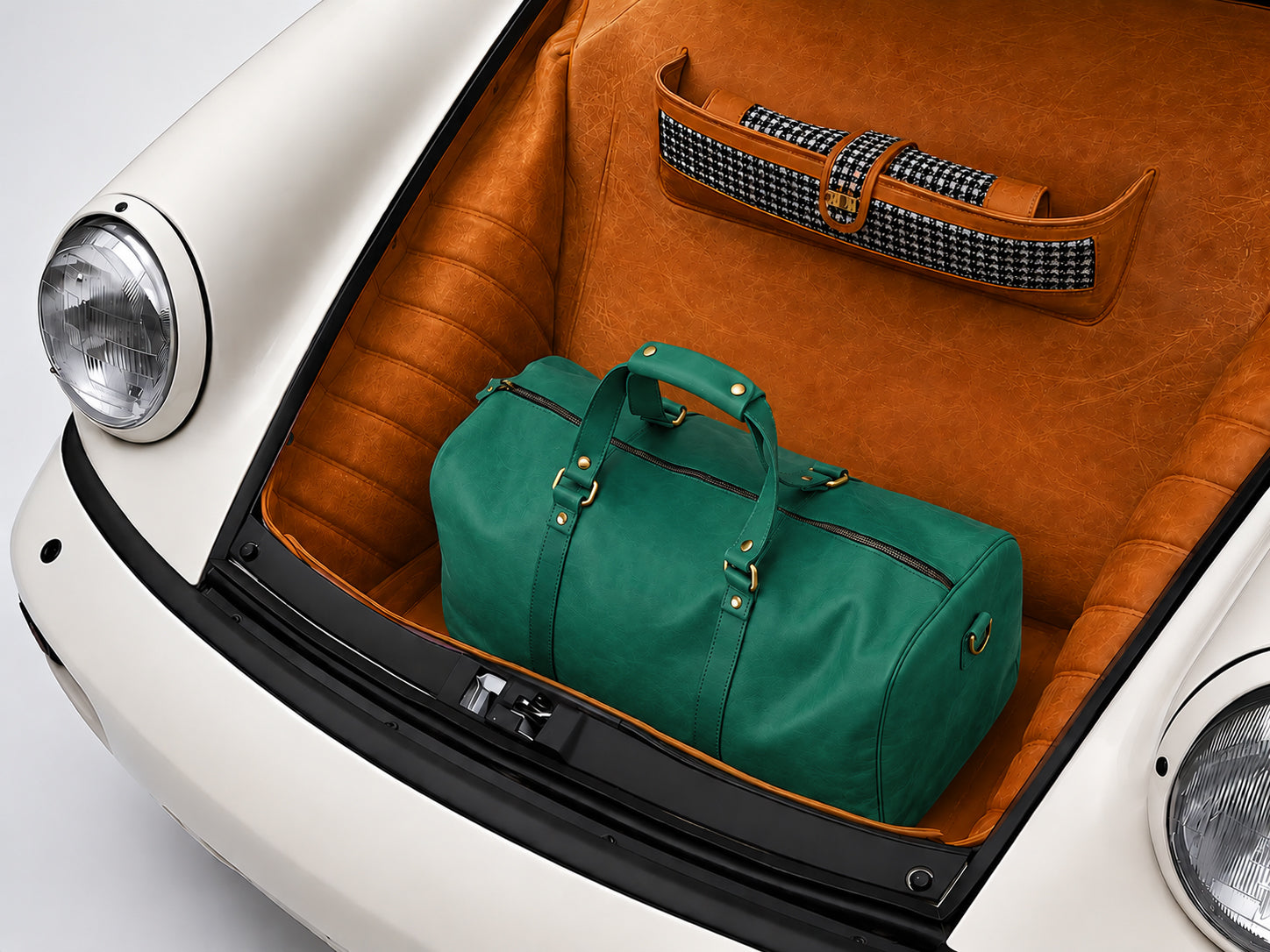 Green duffel bag in the trunk of a car with a brown interior.