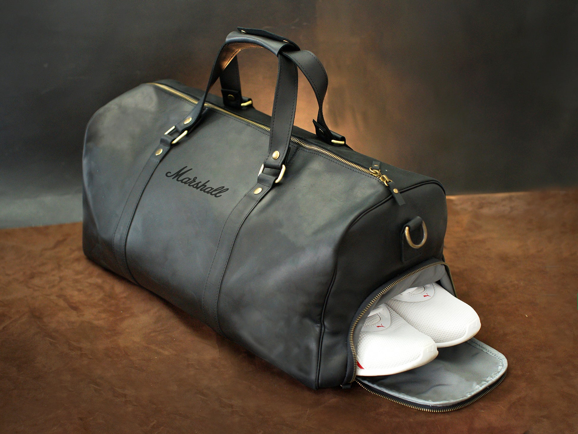 Premium leather weekender bag with name stamp, warm earthy tone