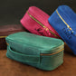 Close-up of leather delicates case zipper and hardware detail