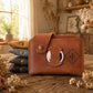 Close-up of leather wallet AirTag compartment and stitching detail