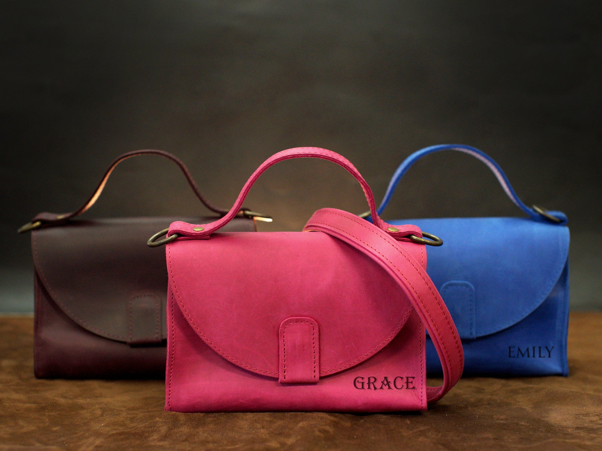 Close-up of leather handbag flap closure and hardware detail