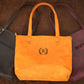 Premium leather shoulder bag with name stamp, warm earthy tone
