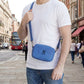 Minimalist leather crossbody bag with adjustable strap, handcrafted design