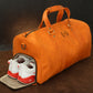 Close-up of leather duffle bag zipper and hardware detail