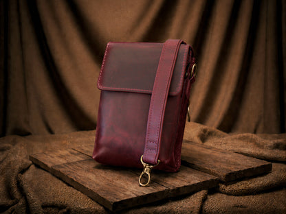 Leather messenger bag closure and hardware detail, durable brass finish